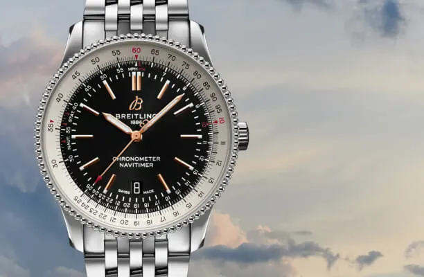 Slide rule bezel watches